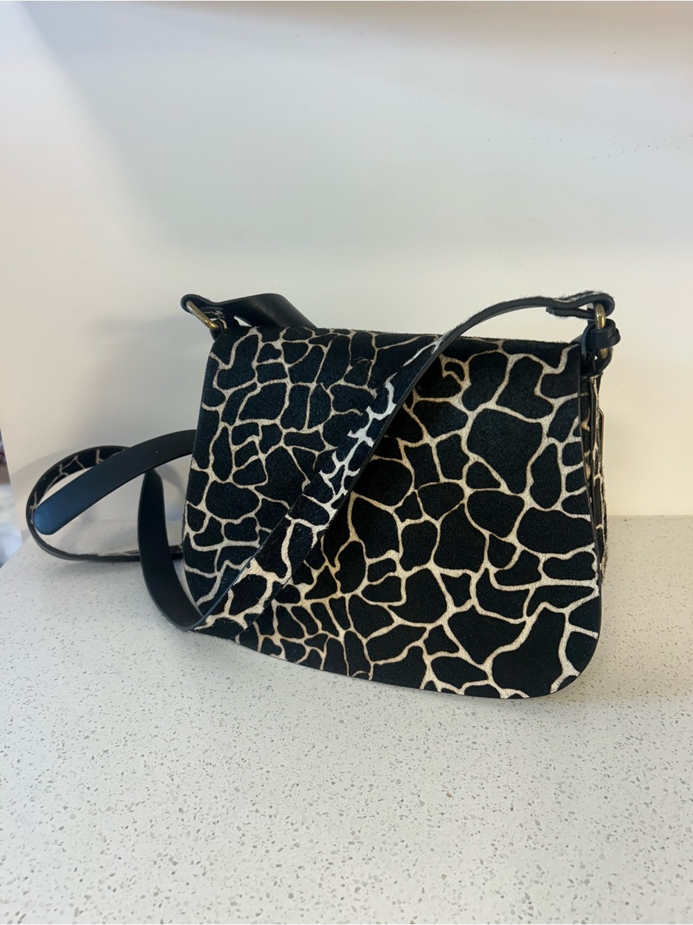 Aldo Black and Cream Giraffe-Print Crossbody Saddle Bag